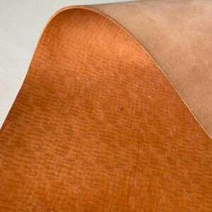 Leather for belt - vegetable tanned, bit rigid, decorated-"cut" surface, 3mm, 152dm2
